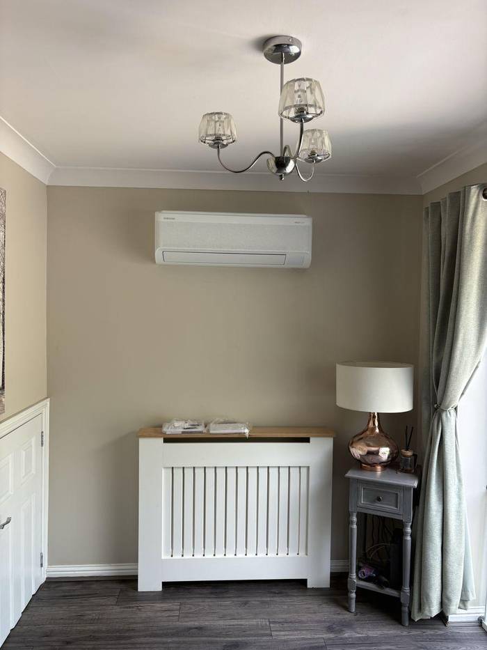 Samsung WindFree air conditioning indoor unit installed above radiator